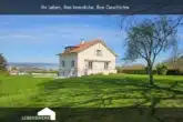 Startbild WebExposè - Wohnen am Sonnenhang – Stilvolles Haus mit Parkgrundstück und Bodenseeblick