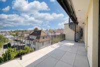Über die elegante Wendeltreppe erreichen Sie Ihre private Dachterrasse