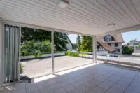 Offener Wintergarten mit Zugang zur Südterrasse