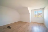 Schlafzimmer mit gemütlicher Dachschräge