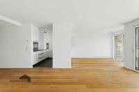 Wohnzimmer mit moderner Küche