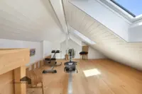 Fitnessbereich unter dem Dach - Obergeschoss