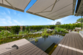 Naturteich zum verweilen - Edler Bungalow mit fantastischer Weitsicht und wunderschöner Gartenanlage – Laufen-Uhwiesen ZH