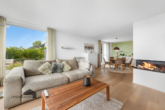 Offenes Wohnen mit Kamin - Edler Bungalow mit fantastischer Weitsicht und wunderschöner Gartenanlage – Laufen-Uhwiesen ZH