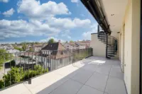 Über die elegante Wendeltreppe erreichen Sie Ihre private Dachterrasse