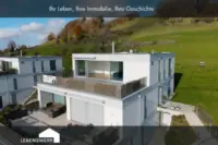 Wo Freiheit beginnt: modernes Attika-Terrassenhaus mit Alpenpanorama
