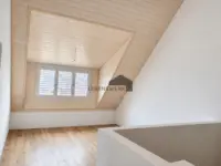 Dachschrägen verleihen dem Haus den Charme.