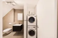 Separates Gäste-WC mit eigenem Waschturm