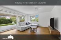 Wohnzimmer mit überdachter Terrasse