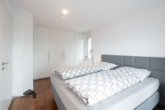Schlafzimmer mit Einbauschrank - Seesichtwohnung mit Panoramablick auf den Untersee – Steckborn TG